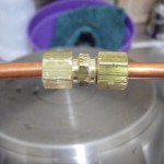 Coupling joining the two copper coil and foot of copper tubing
